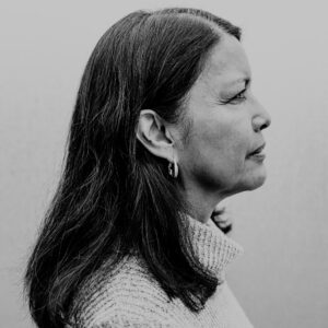 A woman in profile, in black and white